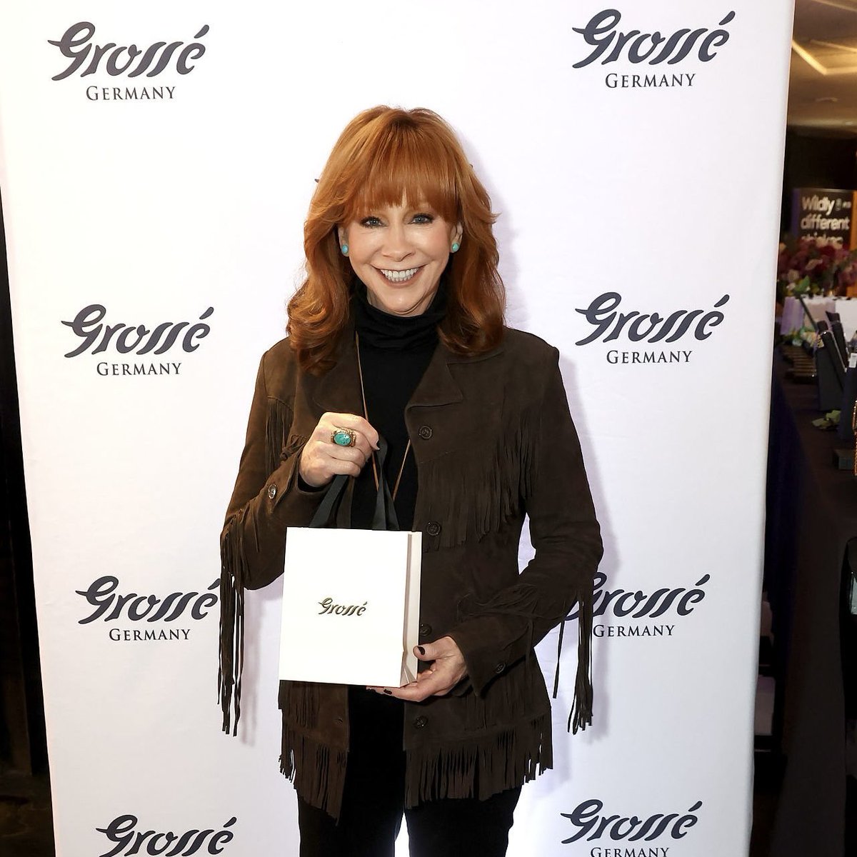 rebawears's tweet photo. reba wears the fringe suede jacket by stetson for the #grammys rehearsal + gift lounge. https://t.co/Wvzslb5McV