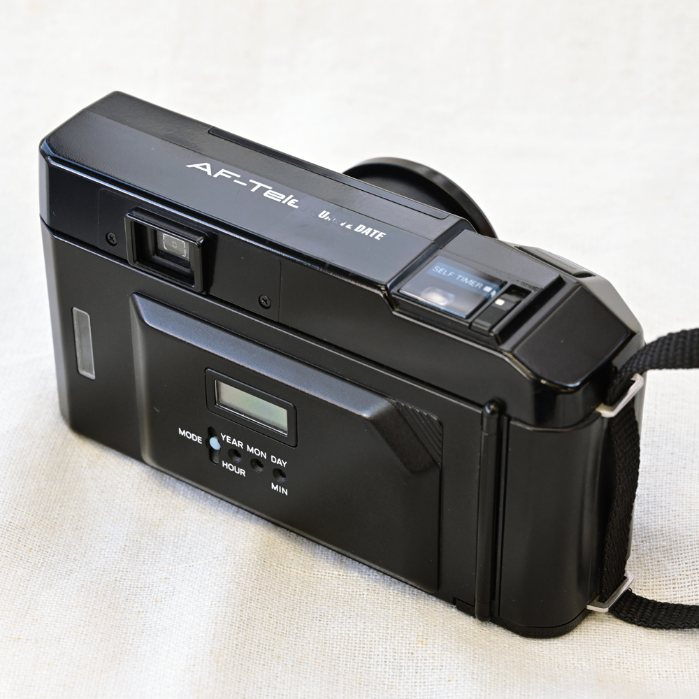 champcamera's tweet image. 中古　MINOLTA AF-TELE ￥6,800- by 青葉台店

1985年発売のミノルタのコンパクトカメラ📸
38mm/60mmの二焦点切替式・レバーでサクッと画角変更ができます！
手に入れやすい単三電池２本で駆動するのが有難いです◎

#中古カメラ #フィルムカメラ #MINOLTA #ミノルタAFTELE #青葉台 #横浜青葉台