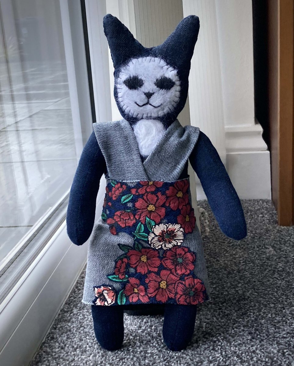My denim cat with needle felted detail is finished. She needs a name. 

.. 

#handstitcheddoll #slowstitching #catdoll #recycledfabric #denimdoll #textileart #folkart