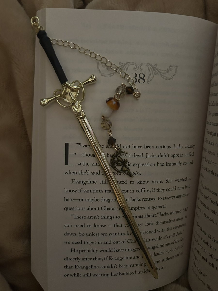 freelysteph's tweet image. absolutely in love with this bookmark my bfs mom gifted me