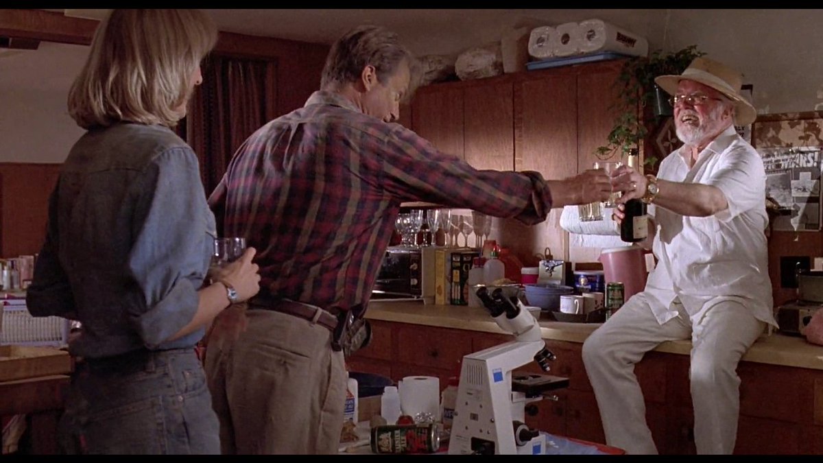 Weirdo billionaire inviting a Montanan paleontologist and his way younger female student to a top secret island