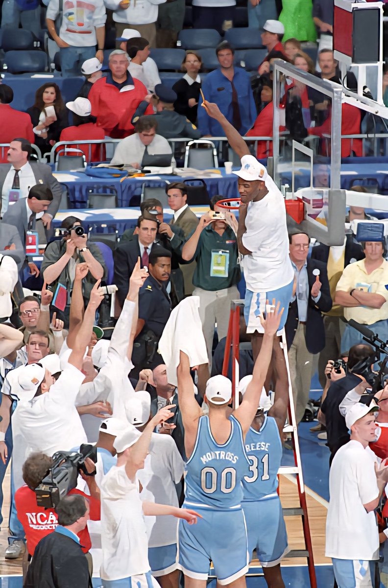 uncsportsphotos's tweet image. Tar Heel Great George Lynch cutting down the nets after winning the 1993 National Championship