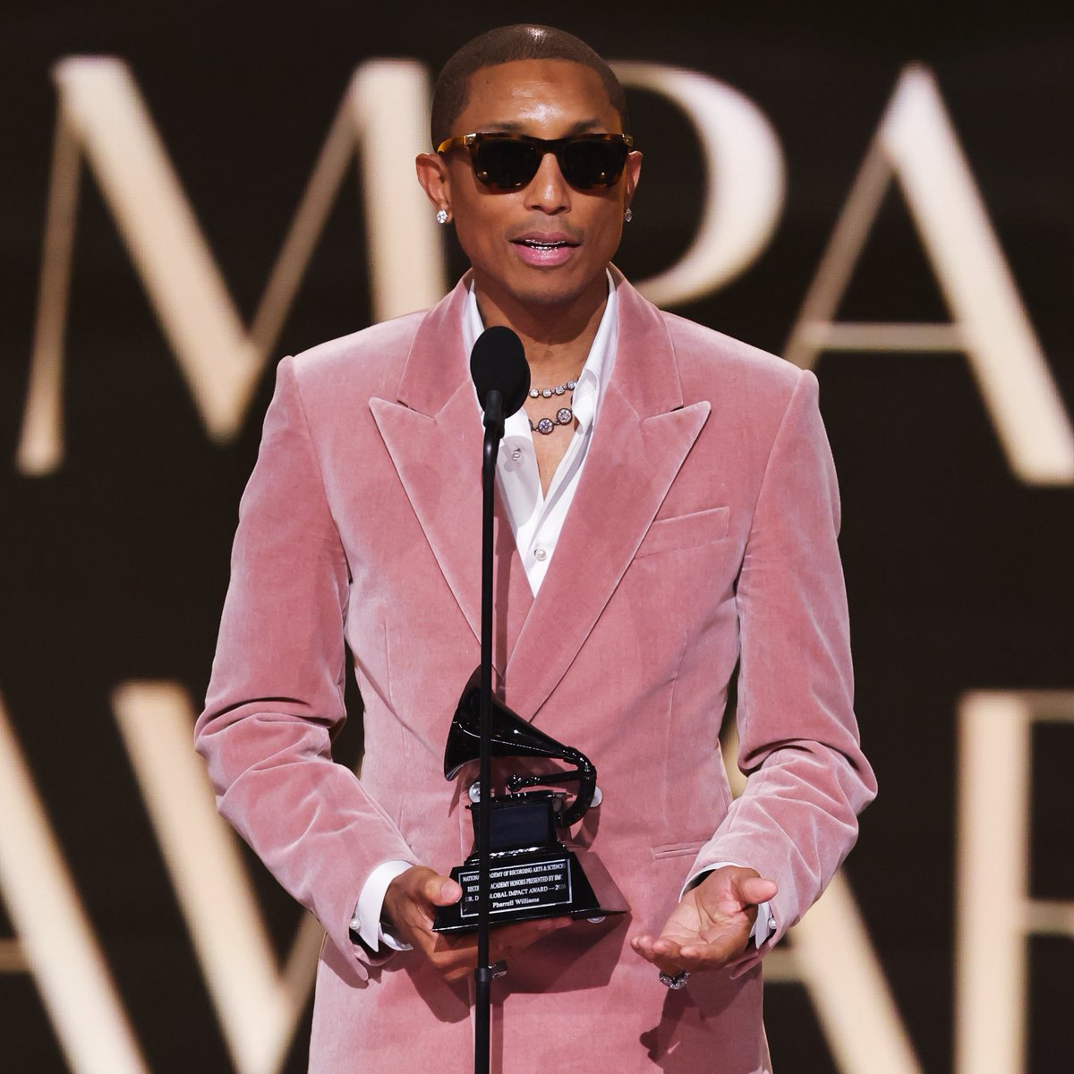 Variety's tweet image. Pharrell Williams is presented the Dr. Dre Global Impact Award at the #Grammys