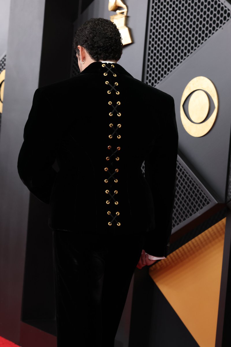 ComplexStyle's tweet image. Bad Bunny looks so sharp in the first- ever Schiaparelli menswear at the #GRAMMYs