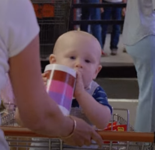 torres_bal93914's tweet image. A baby holding the stuff (1985) #baby #stuff #thestuff