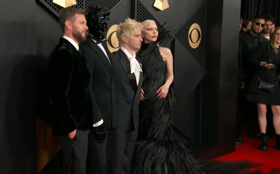 ladygaganownet's tweet photo. Lady Gaga posing with her producers, Cirkut, Gesaffelstein, and Andrew Watt on the red carpet at the #GRAMMY Awards. https://t.co/uIsKGAFbKD