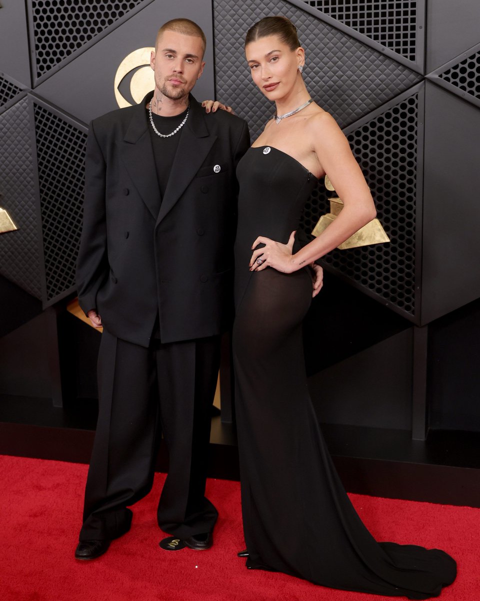 enews's tweet photo. You better belieb it! 🤩 Justin and Hailey Bieber have arrived to the #Grammys. (📷: Getty) https://t.co/wBonFlGQ89