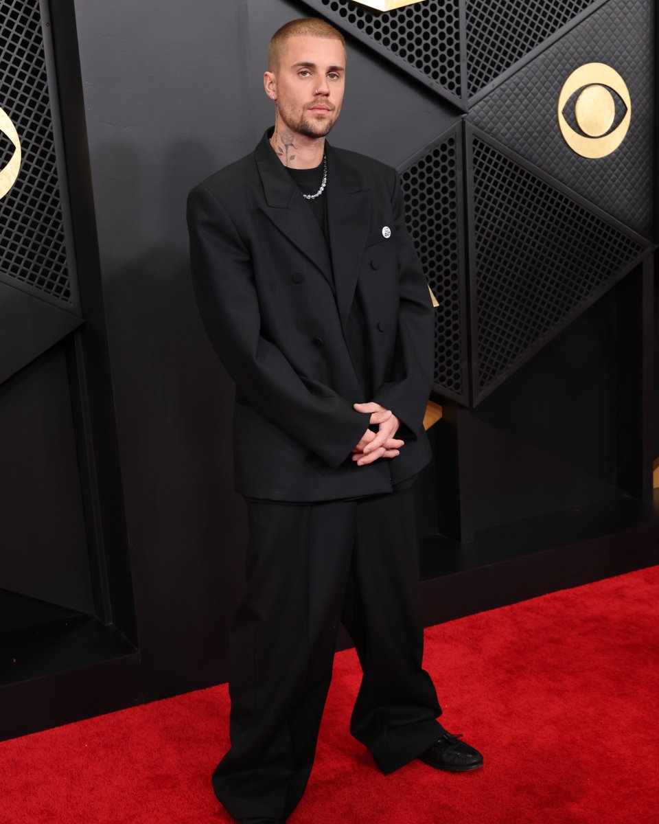 enews's tweet photo. You better belieb it! 🤩 Justin and Hailey Bieber have arrived to the #Grammys. (📷: Getty) https://t.co/wBonFlGQ89