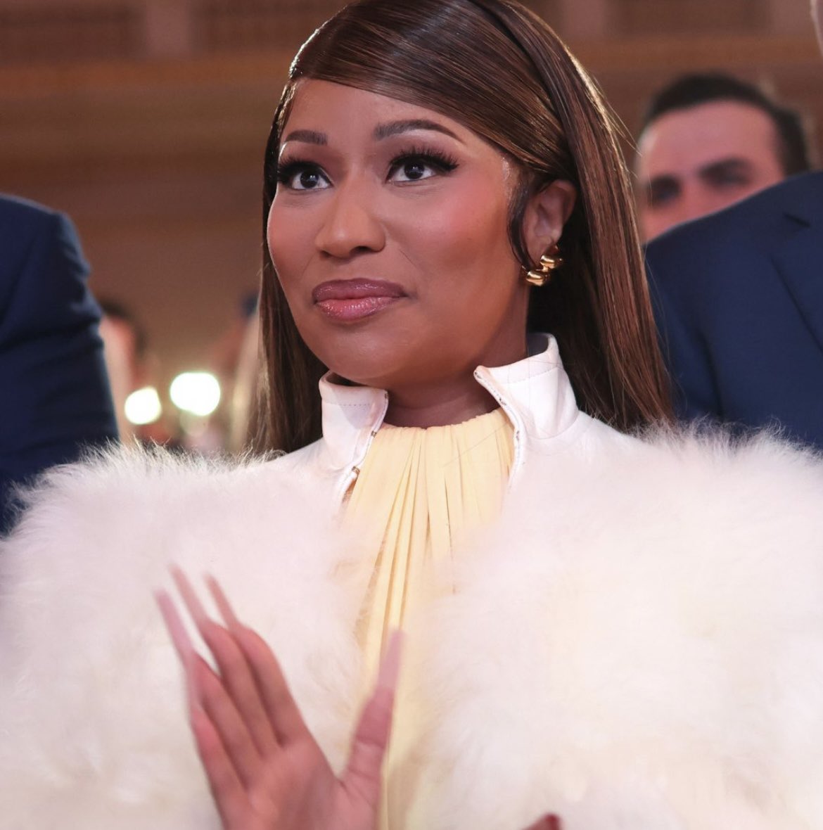 PopCrave's tweet photo. Nicki Minaj reacts to Chrissy Teigen seemingly taunting her through the camera after Trevor Noah joked about her supporting Trump:

“Everyone knows Chrissy Tiegan has/had a dik. Allegedly” https://t.co/ULSIoOBelv
