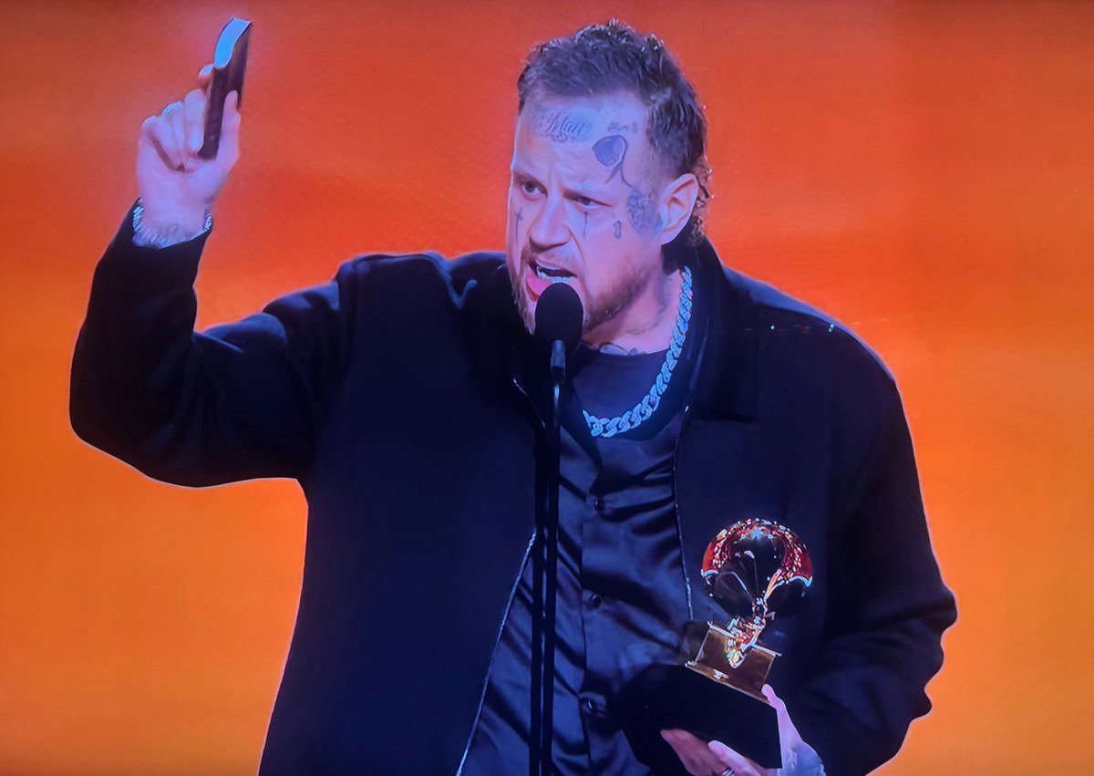Jelly Roll just walked onto that Grammy stage and did what most of these celebrities are too scared to do.

He pulled out a Bible.
He thanked God for pulling him out of a deep, dark place.

And you could tell some of that crowd got uncomfortable.

Then he said it anyway:

“Jesus