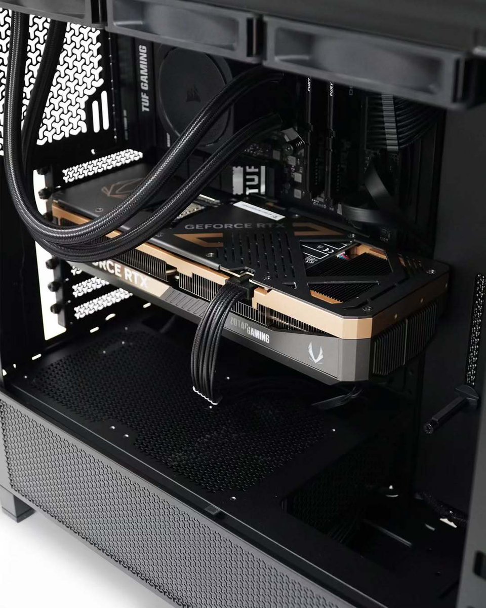 ZOTAC's tweet image. An all-black PC build with a splash of Titanium Gold ✨

IG: @cuboproject.computer

#ZOTACGAMING #ZOTAC #GEFORCE #RTX #PcBuild #GamingPC #PcSetup #Tech #PcHardware #PcComponents #PcGaming