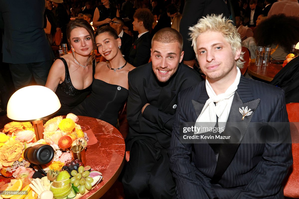 biebercentraI's tweet image. Justin Bieber and Hailey Bieber with Charlotte Lawrence and Andrew Watt at the 2026 #GRAMMYs.

(Photo by Kevin Mazur/Getty Images for The Recording Academy)
