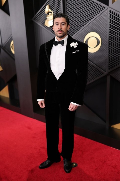 loriasanchez's tweet photo. Bad Bunny + Schiaparelli = Match made in fashion heaven. Bad Bunny es muy guapo. Viva Puerto Rico 🇨🇺.Congratulations on Album of the Year Grammy as the 1st Spanish language artist &amp; can't  wait to see him at the halftime show during Super Bowl LX next Sunday. https://t.co/m57eXHZOTQ