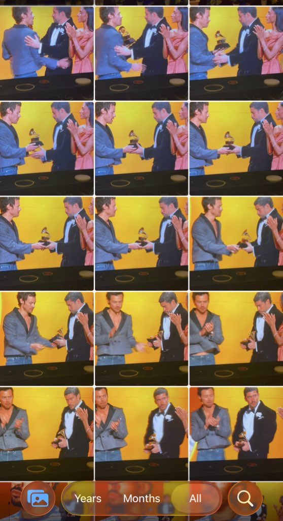 taking pictures of harry giving bad bunny his aoty grammy like im at a concert