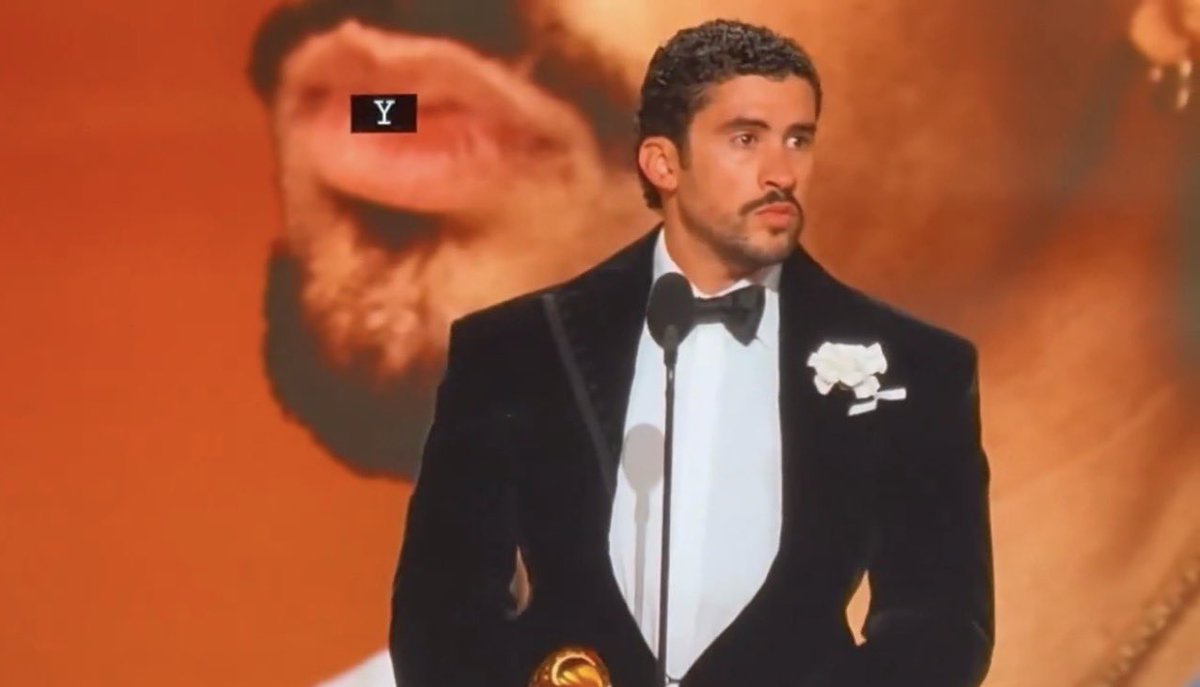 BuzzingPop's tweet image. “I dedicate this award to all the people who left their homeland, their country, to follow their dreams.”

— Bad Bunny winning ‘Album of the Year’ at the 2026 #GRAMMYs