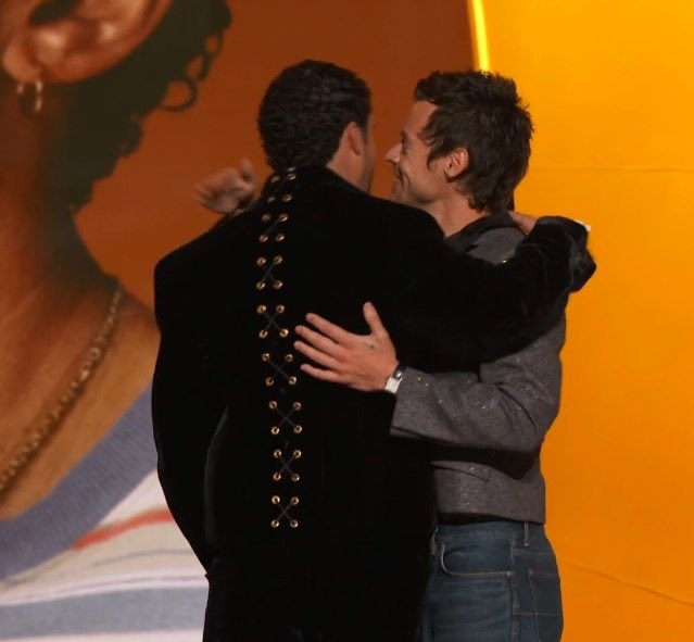 hsdaily's tweet image. Harry and Bad Bunny hugging at the 2026 #GRAMMYs in Los Angeles, California - February 1