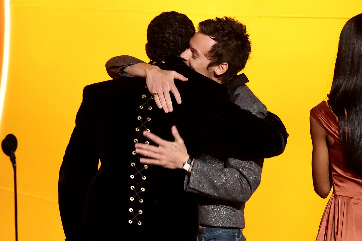 Bad Bunny hugs Harry Styles while accepting his #Grammy for Album of the Year