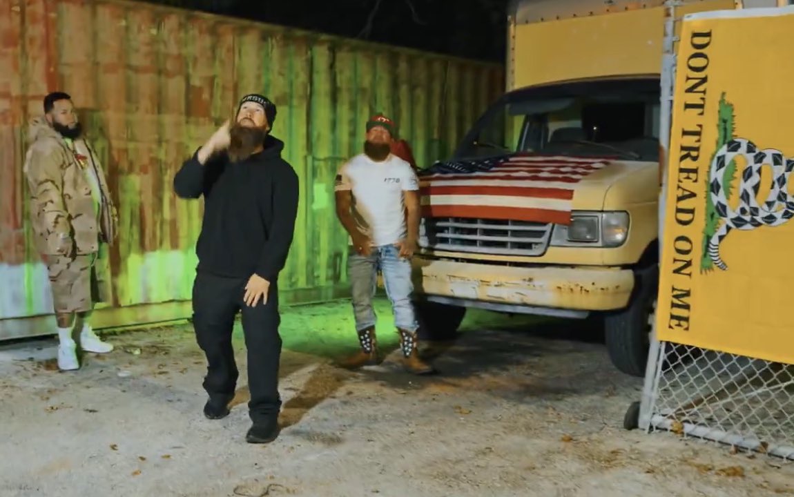 damintoell's tweet image. The Gadsen flag is a nice touch in a song about how great federal law enforcement is