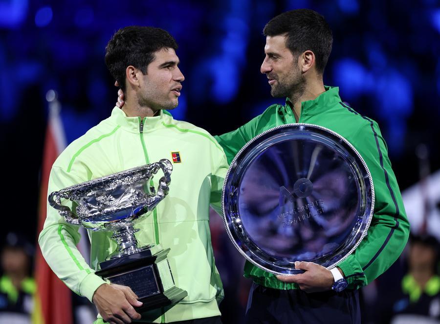 ChinaDaily's tweet image. Top seed #CarlosAlcaraz won his first #AustralianOpen title on Sunday to complete his set of major trophies after outlasting #NovakDjokovic in the final.

In chilly conditions at Rod Laver Arena, the 22-year-old Alcaraz became the youngest winner of all four Grand Slam