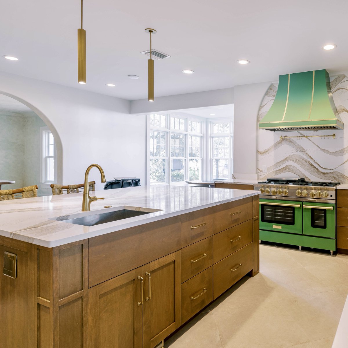 NelsonConstReno's tweet photo. From Flood Damage to Dream Kitchen: A True Transformation
When storms flooded this home, flood cuts brought it down to the studs. Instead of just rebuilding what was lost, our clients seized the opportunity to create their dream kitchen.
Our custom cabinet division designed and built a curved breakfast booth to perfectly complement the flow of the space. Paired with custom cabinetry, a show-stopping green range and hood, quartz countertops, and warm wood tones throughout.
Here's what made this project special:
Complete restoration after storm flooding
Custom-built curved breakfast booth by Nelson Custom Cabinets
Statement green appliances with brass fixtures
Mix of modern luxury and timeless craftsmanship
Ready to transform your space? 
Visit https://t.co/0iAOFZ1Ccz
#NelsonConstructionRenos #FloodRestoration #CustomCabinets #TampaBayRenovations #ClearwaterContractor