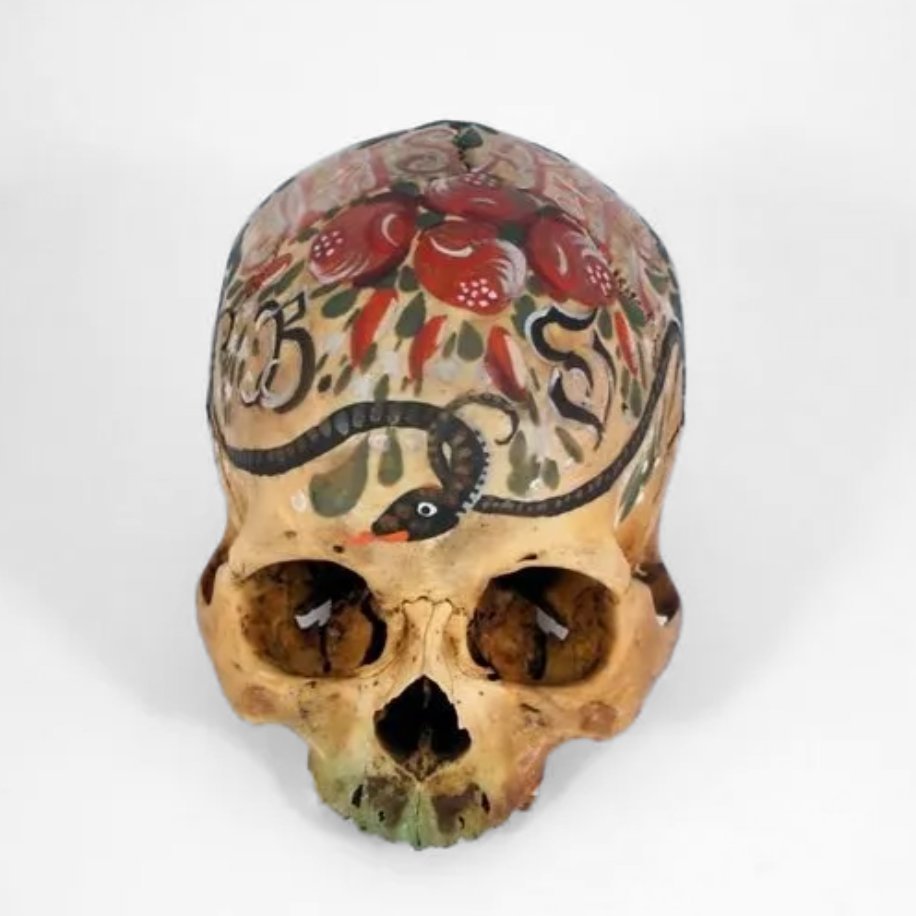 archaeologyart's tweet image. Painted skull with a snake motif and initials, Eastern Alps, 19th c.
