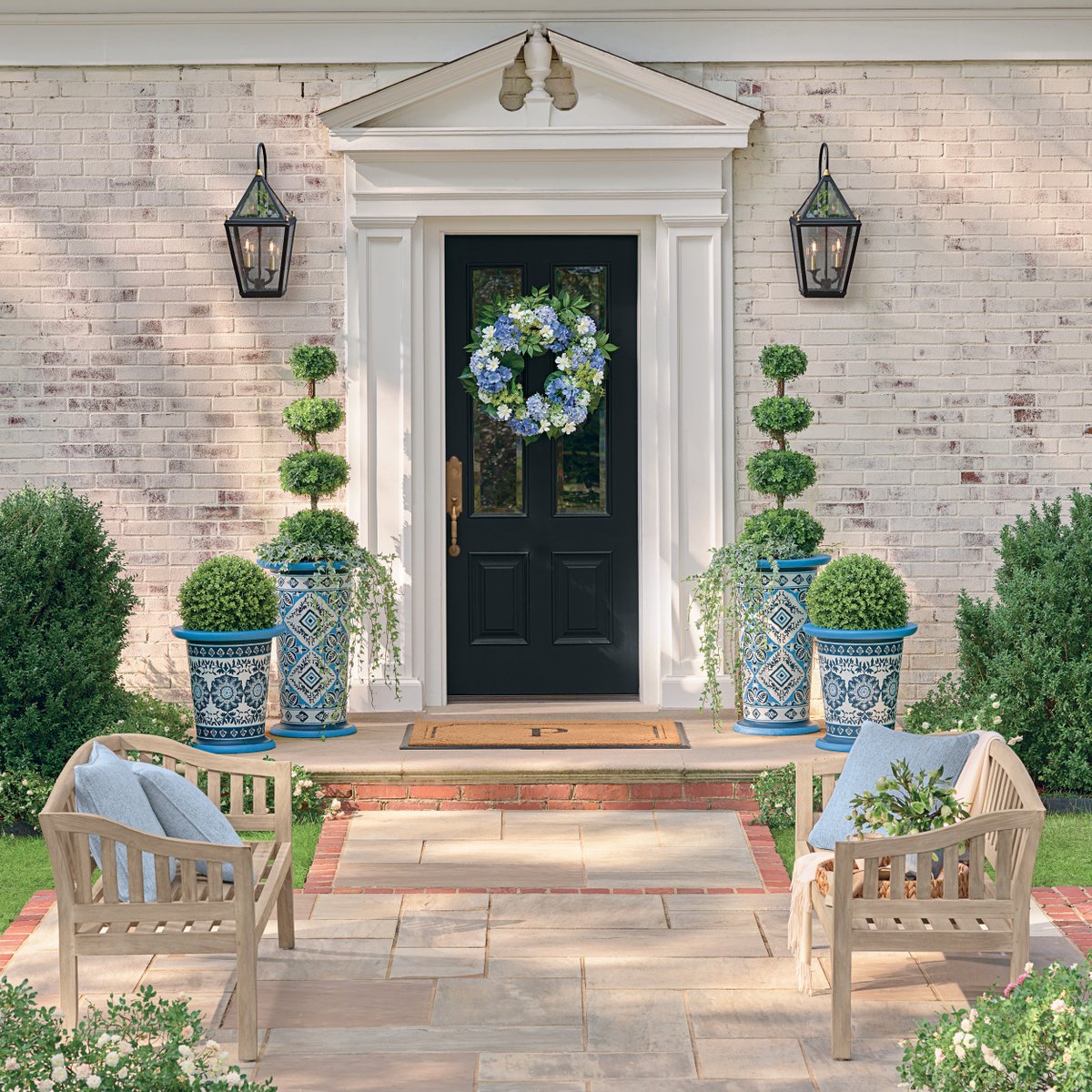 Is spring on its way? No matter, you can enliven your outdoor space with color-rich accessories and lush faux topiaries. bit.ly/4s6rchJ