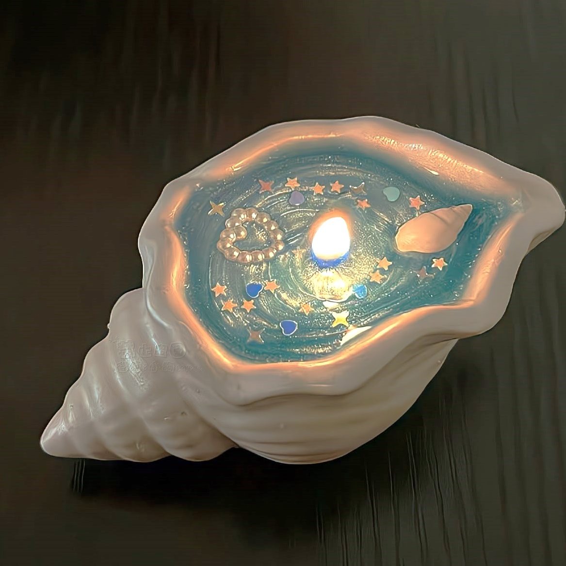 dreamyyarchive's tweet image. seashell candle
