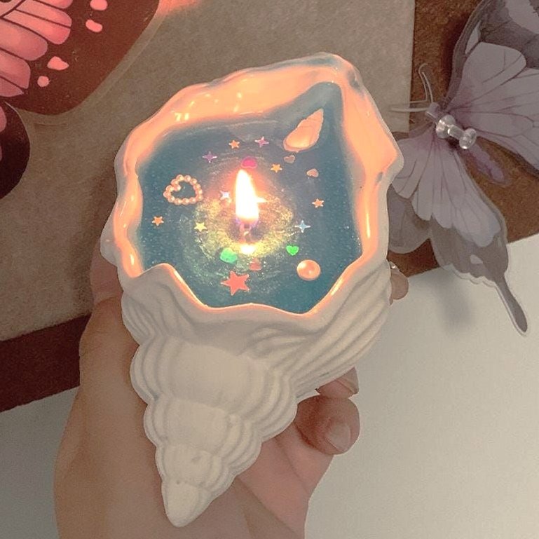 dreamyyarchive's tweet image. seashell candle