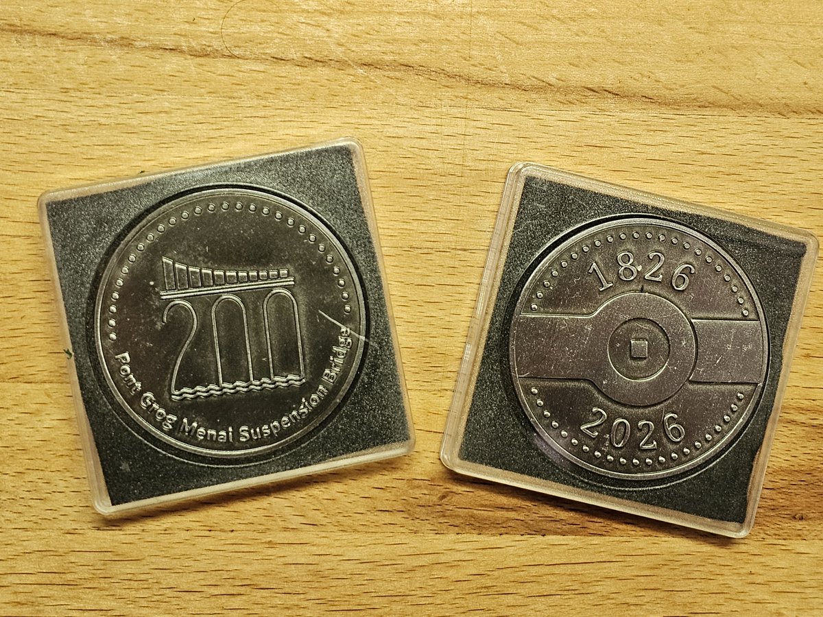 AngleseyHist's tweet image. I picked up a few of the Menai Suspension Bridge Bicentenary souvenir coins this morning, ready to send to some bridge-loving friends. You can buy them for £5 (cash) each at the MB Town Council office at the Coed Cyrnol car park (9am-1pm, Mon-Thurs). facebook.com/permalink.php?…