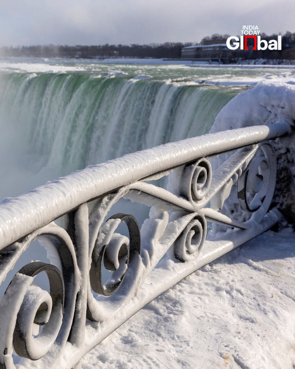 ITGGlobal's tweet photo. Niagara Falls has turned into a frozen wonderland as temperatures plunge below -20°C amid a polar vortex. Ice covers the falls, surrounding rocks, and trees, creating a stunning winter spectacle. Visitors are braving the chill to capture the icy scene.
#NiagaraFalls #FrozenFalls #PolarVortex #WinterWonderland #IndiaTodayGlobal