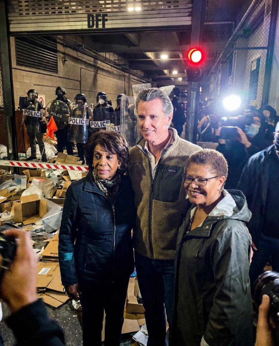 Communists catching a photo op at the anti-ICE Riots to distract from the coming fraud investigations that will ruin their shitty lives.