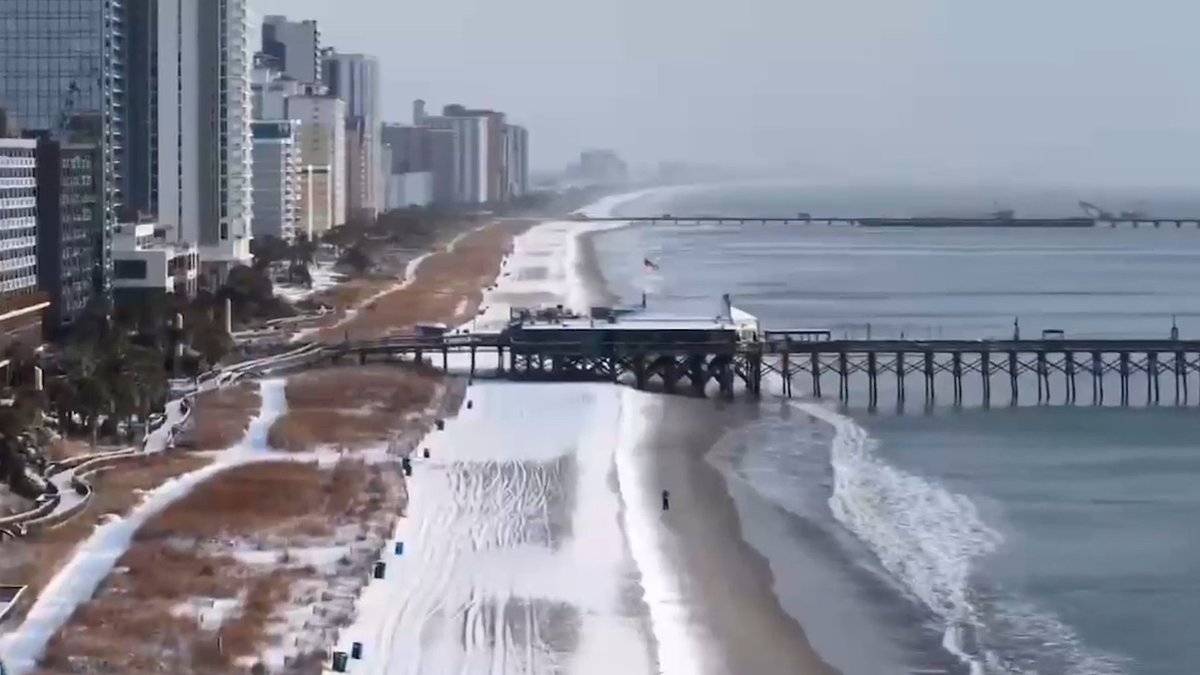 weatherchannel's tweet photo. Drone video gives you an amazing view as snow clashed with golden sands and crashing waves along Myrtle Beach in South Carolina after Winter Storm Gianna dropped snow across the Carolinas. https://t.co/tp0zl9tFjt https://t.co/5LQ8FJaKZe