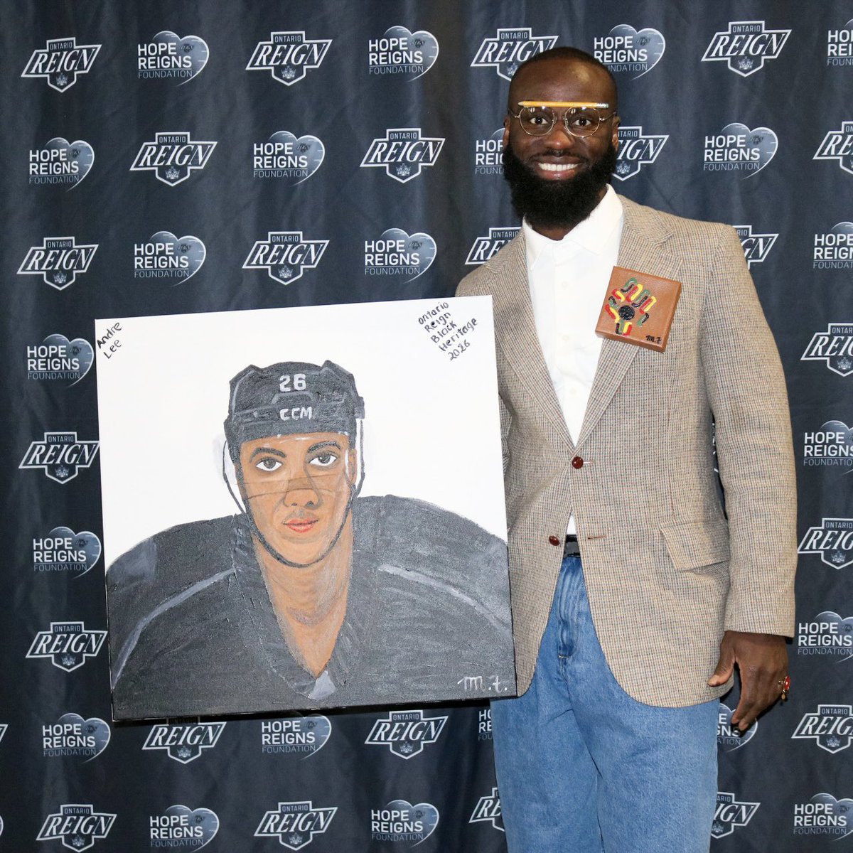 MFTheBrand's tweet photo. Celebrating Black History Month last night at the @ontarioreign Black Heritage Night game with proceeds of the in-game painting benefitting the Reign Foundation. Thank you for having me! ✊🏿 https://t.co/SjZmluchV8 https://t.co/eAebTHYViv