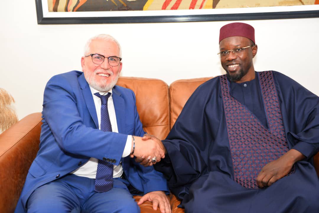 WarriorofSN's tweet photo. @MameOmar1 Mohamed Jamil Derbah qui est cité dans les scandales notamment deals de drogue et de corruption ici au côté de sonko , est ce que cela fait de sonko un dealer ? https://t.co/cwRccGPOqJ