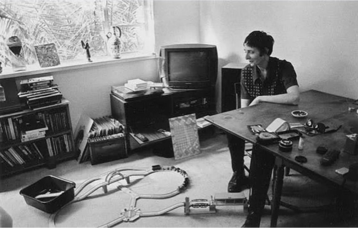 Rowland S. Howard with his train set, records &amp; books, 1999.