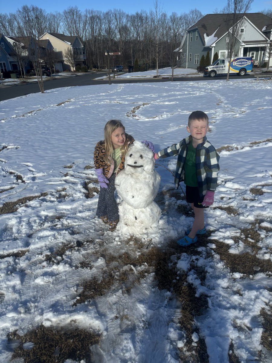 Grandkids first snowman. They have not seen snow like this before. #carolinasnow