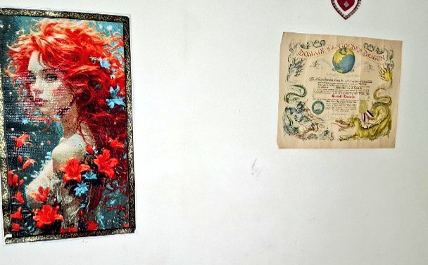 Real_DominiqueE's tweet photo. This is a two things Two Men and a Truck left on the wall at my house. One is a diamond painting I did. The other is the crossing of the Meridian my deceased father did during the Apollo mission. No care whatsoever. Thank goodness we could go back and get them. #TwoMenandaTruck https://t.co/uuUFj77KB9