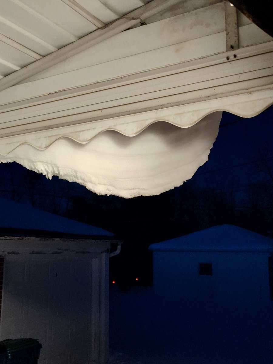 ordinaryguy64's tweet image. Snow hanging off my awning