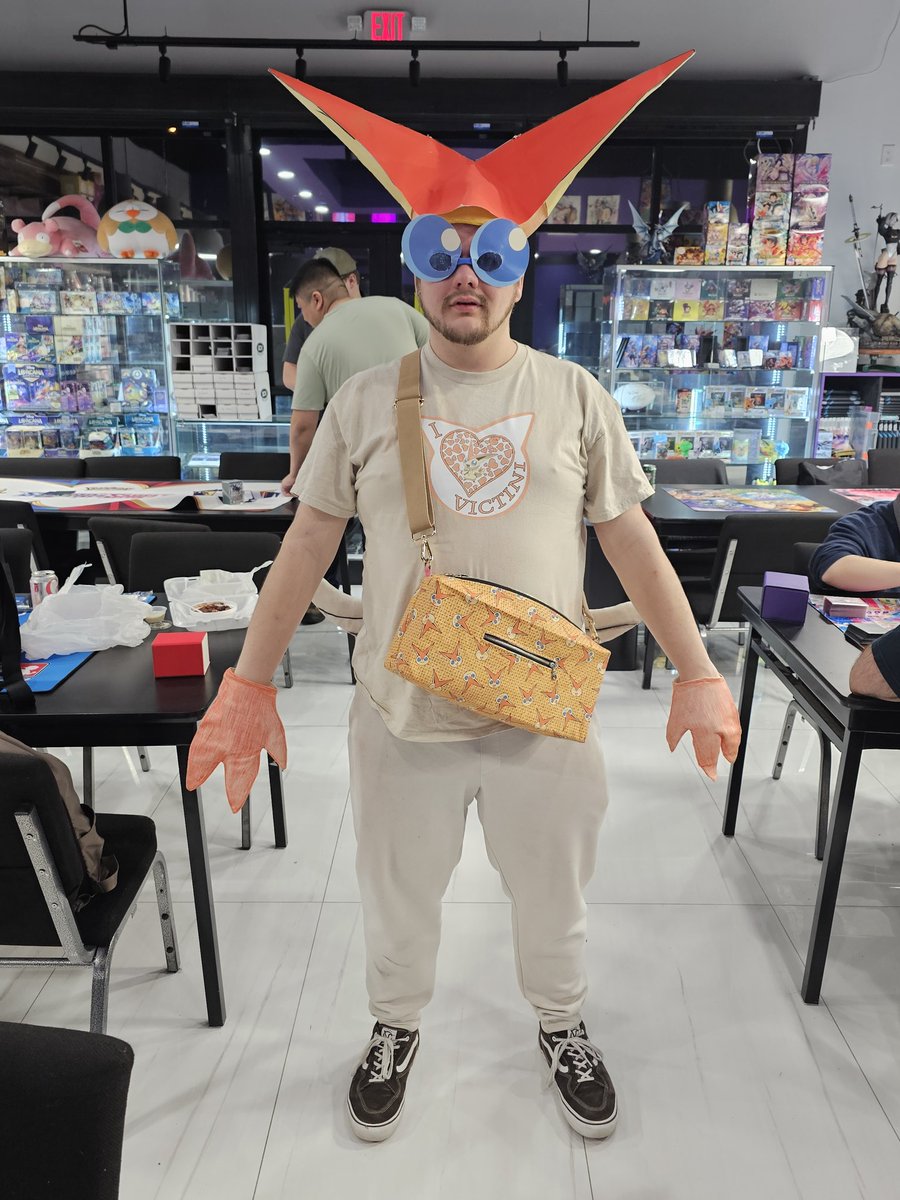 Boiler Room did a fantasy football league this year and the winner got to give the loser a punishment.

Anyway here's <a href="/BopperPKMN/">B0pper</a> dressed up as Victini using a Victini deck at a TCG League Challenge