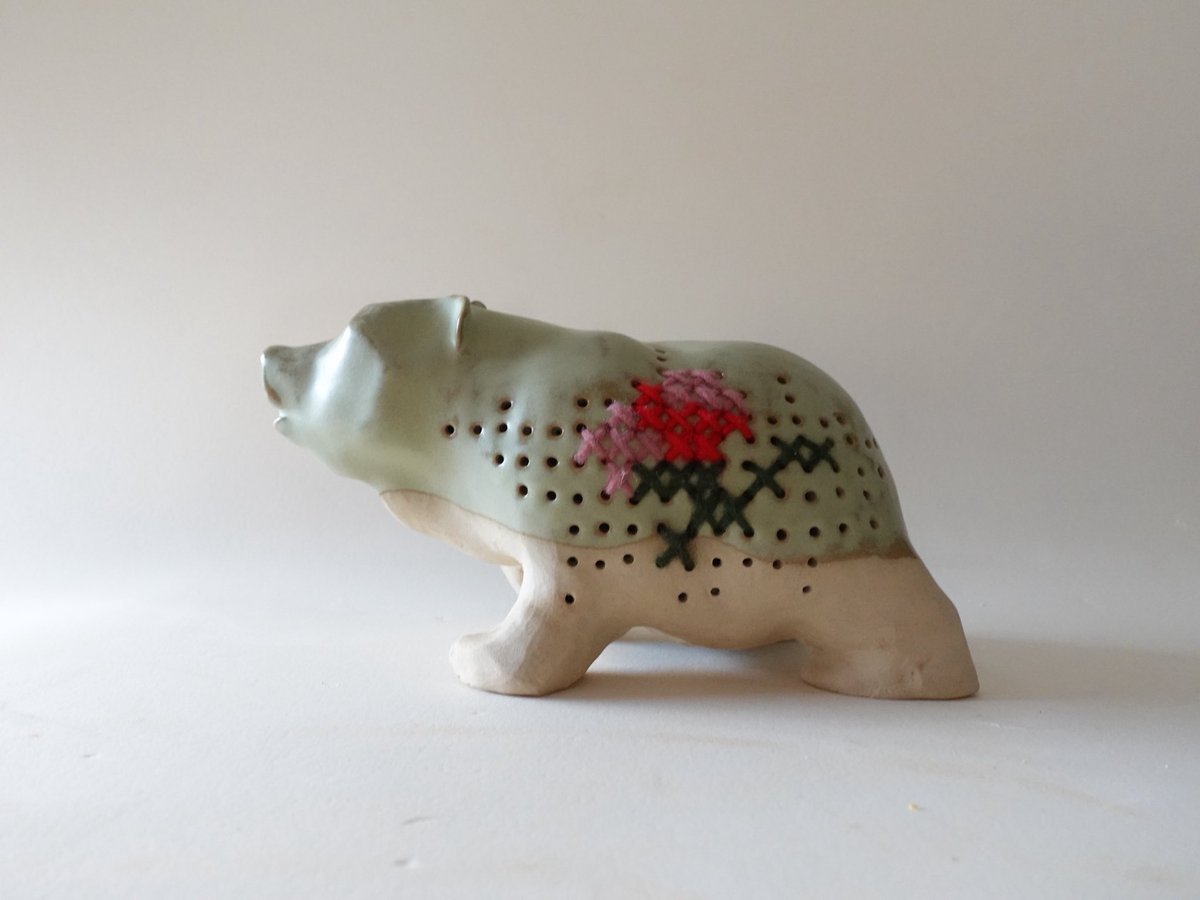 Cross-stitched pottery!