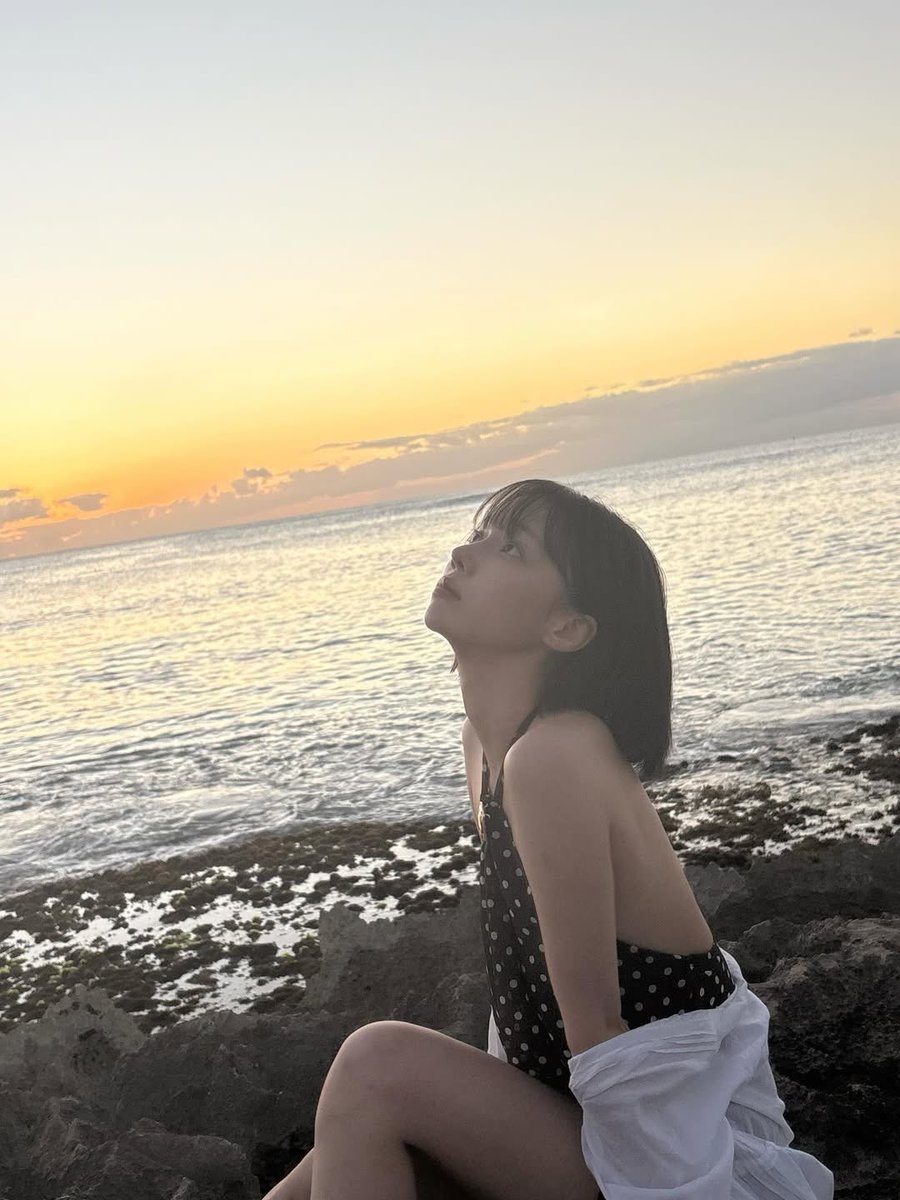 winter is the most beautiful site in this picture even with a hawaiian sunset behind her