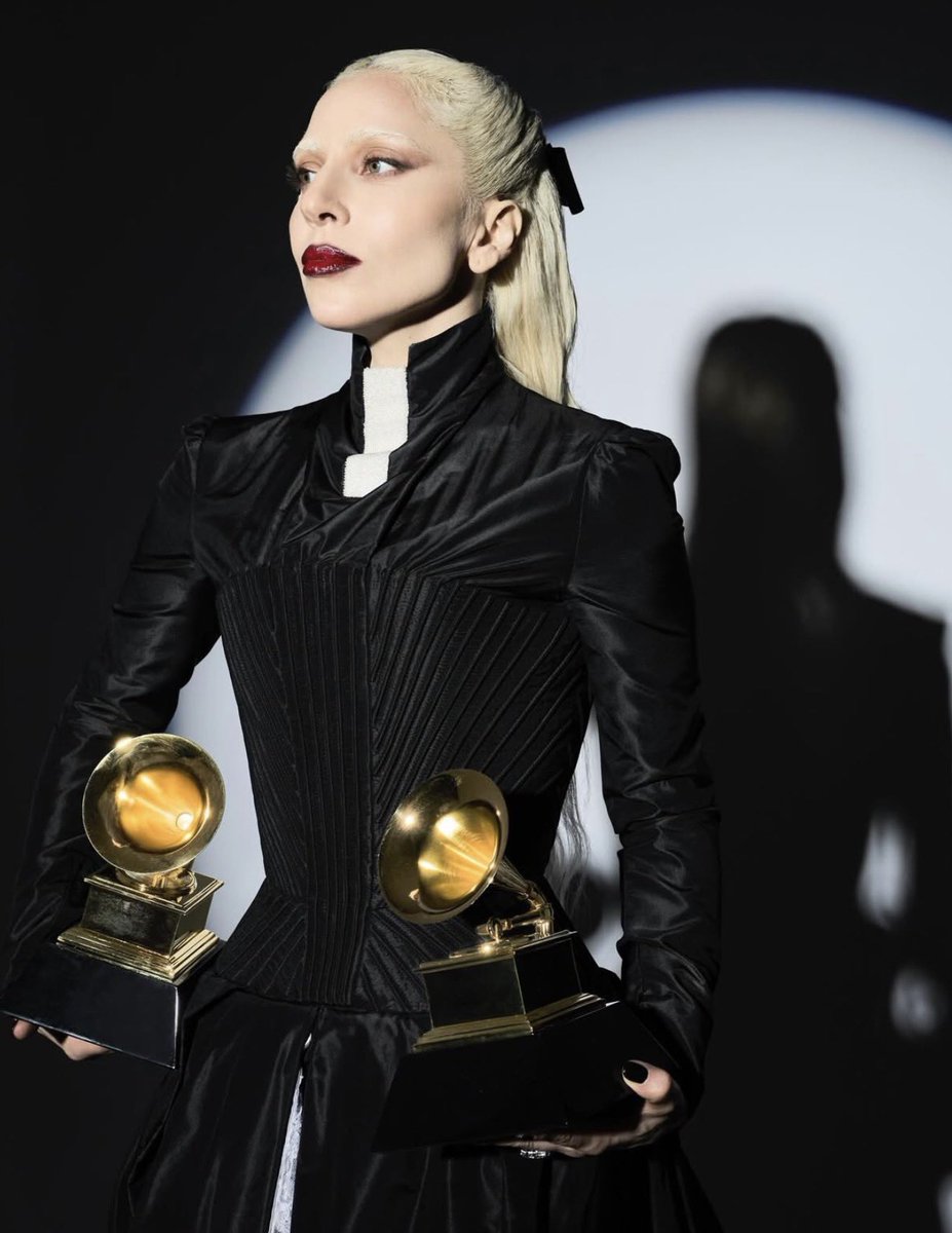 PopTingz's tweet image. Lady Gaga looks absolutely gorgeous in new photos posing with her #GRAMMYs