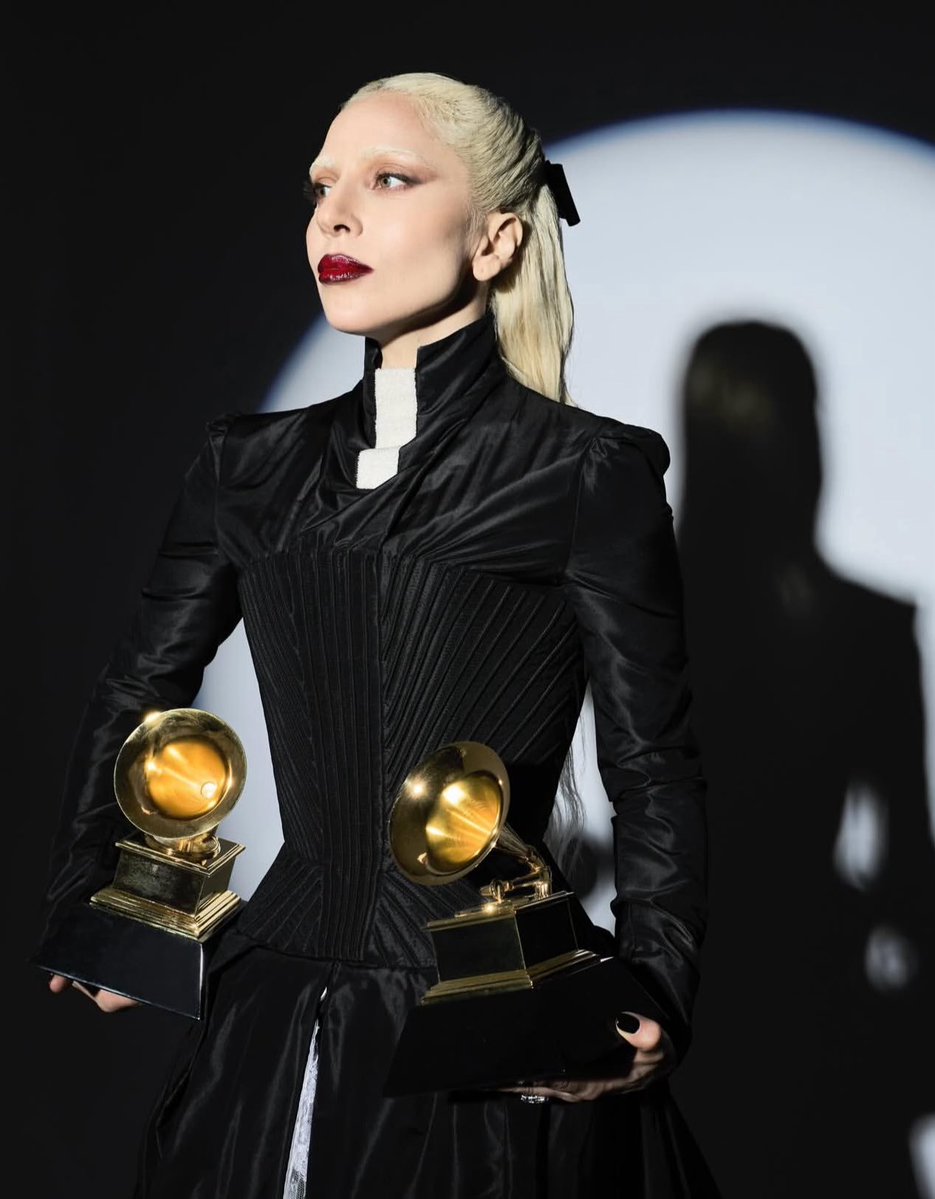 PopBase's tweet image. Lady Gaga stuns with her #GRAMMYs awards.