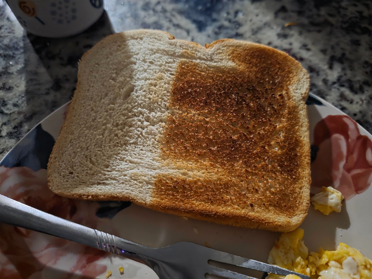 My stupid dumb bread didnt fit all the way in the toaster