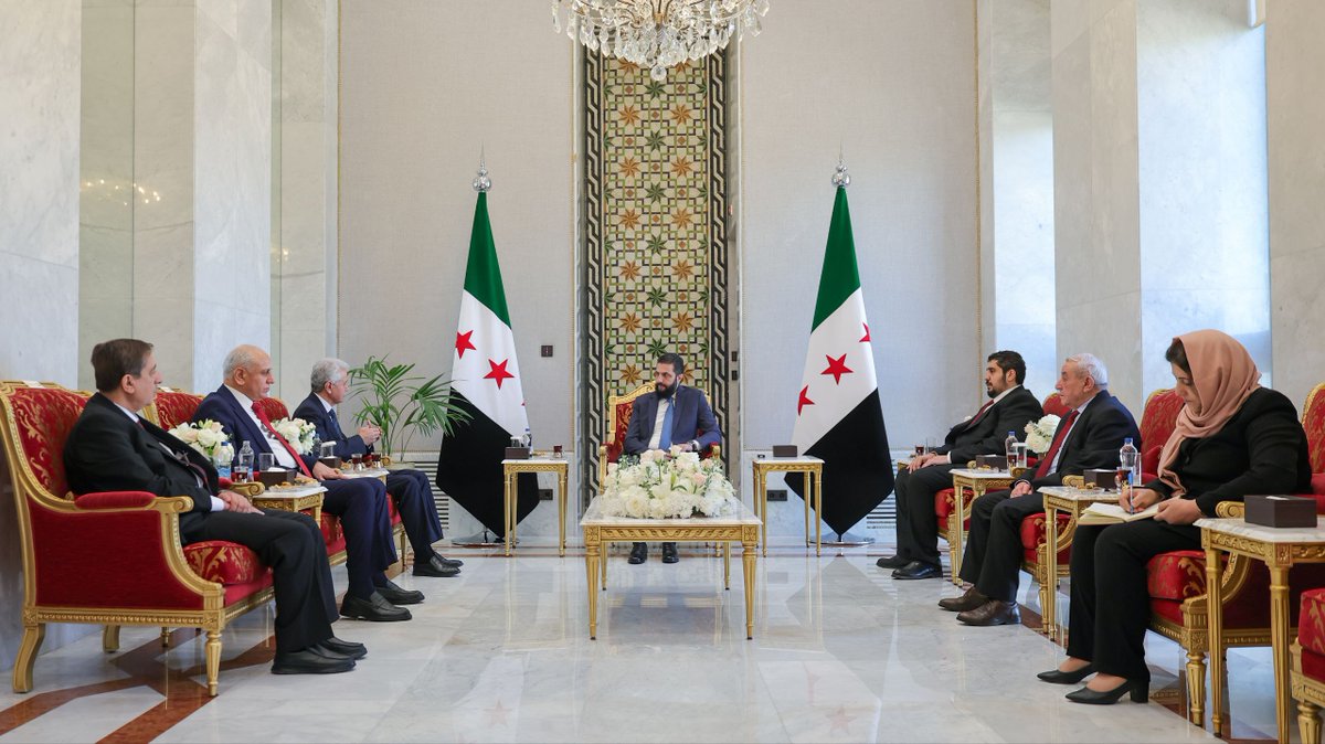QUSAY_NOOR_'s tweet photo. President Ahmed al-Sharaa met today at the People’s Palace in Damascus with a delegation from the #Kurdish National Council, during which he affirmed the state’s commitment to guaranteeing the rights of Kurdish citizens within the framework of the constitution. 
For its part, the delegation welcomed Presidential Decree No. 13, considering it an important step toward strengthening rights and preserving cultural and social #identity.