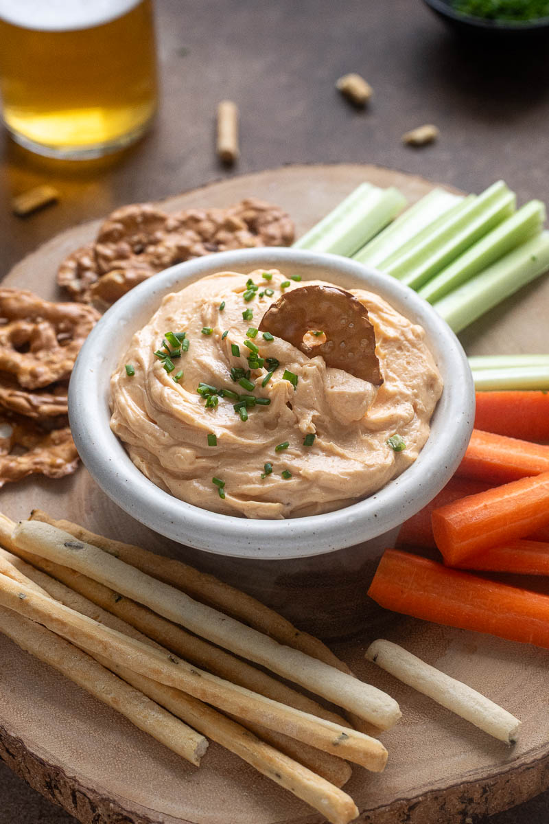 Homemade Pub Cheese is smooth, creamy and made with real cheddar cheese (not Velveeta!). It's an easy pub-style spread for pretzels, burgers, cheese boards and more! flavorthemoments.com/spicy-cheddar-…