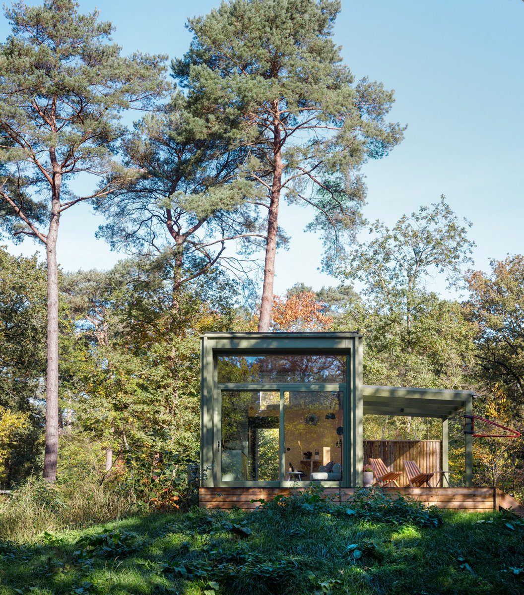 dezeen's tweet photo. Compact holiday cabin by i29 "functions as a Swiss army knife": https://t.co/I06xnU0jvO https://t.co/9CQw8S0wGm