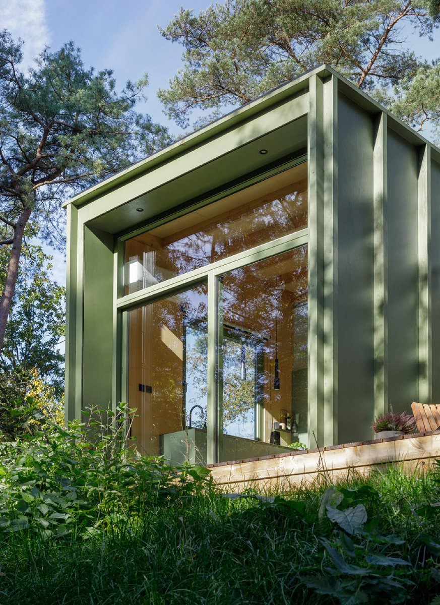 dezeen's tweet photo. Compact holiday cabin by i29 "functions as a Swiss army knife": https://t.co/I06xnU0jvO https://t.co/9CQw8S0wGm