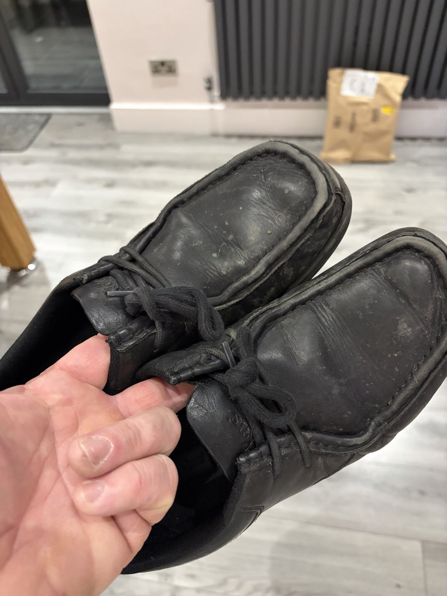 dpsbuilding's tweet photo. @KickersUK so is this normal, my 13 yr old goes through 3 pairs of these a term? Since October? The Amazon bag in the background is yet another pair🤷🏽‍♂️ https://t.co/vf8uF0XhaG