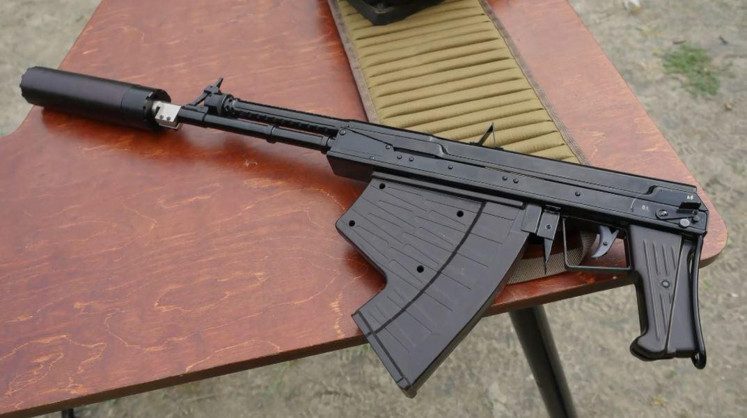 DocStrangelove2's tweet photo. Apparently a suppressor has been developed for the APS underwater rifle, because why not? https://t.co/hnbXfaQHWm
